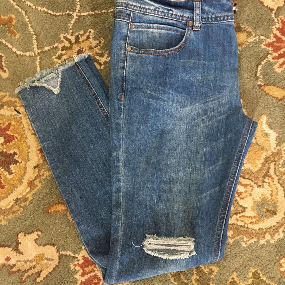 Juniors Distressed Knee Raw Hem Skinny Jeans